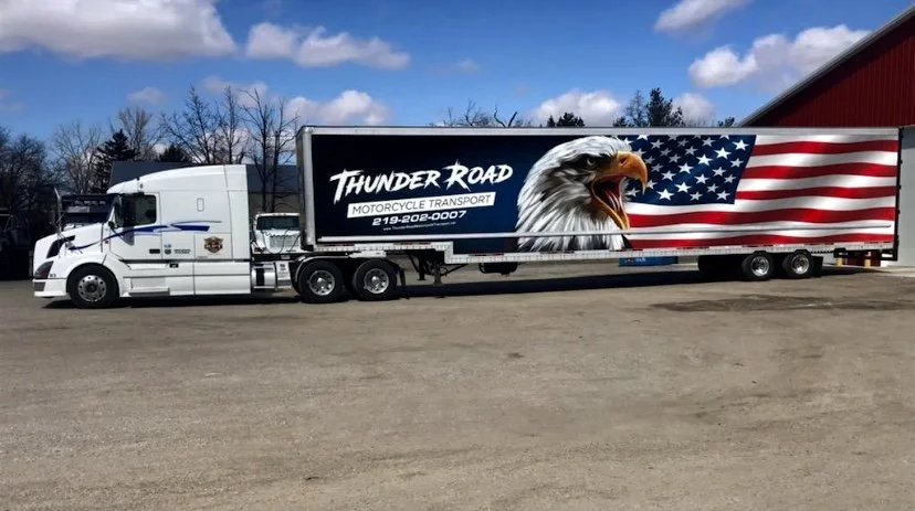 A Thunder Road semi-trailer wrapped with an eagle and American flag design
